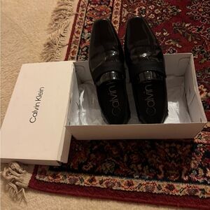 Men’s dress shoes by Calvin Klein size 7.5 black preowned only one time wear